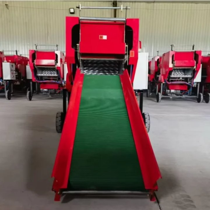 Botteleuse d’ensilage avec tapis d’alimentation